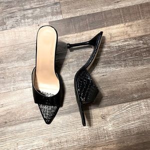 Black pointed toe heels
